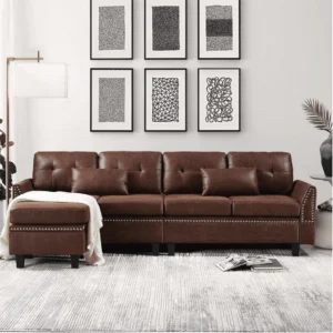 Sofa featuring suede leather upholstery and wooden legs.
